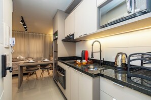 Comfort Studio | Private kitchen - MUV Residence (Curitiba)