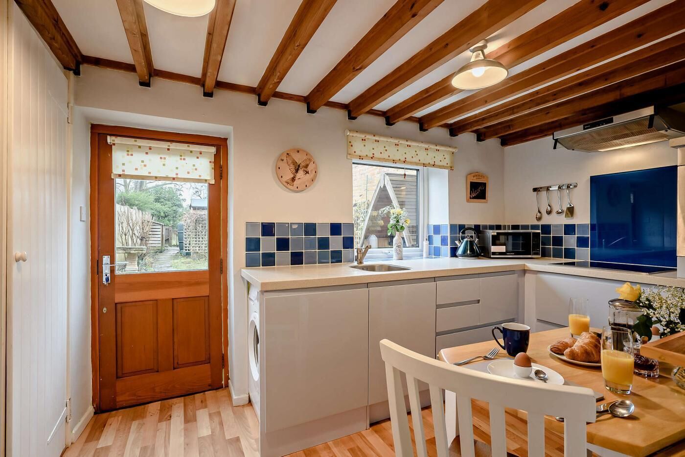 Microwave, oven, high chair, cookware/dishes/utensils