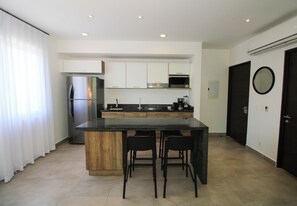 Luxury Apartment, 2 Bedrooms, Pool Access, Garden View | Private kitchen | Espresso maker - Sirenis Escape (Akumal)