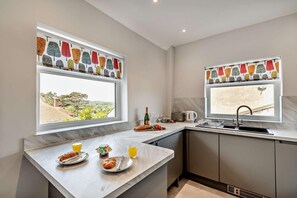 Dishwasher, high chair, cookware/dishes/utensils - 3 Bed in Tenby (oc-c27685) (Tenby)