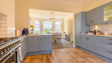 Oven, dishwasher, highchair, cookware/dishes/utensils