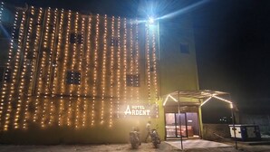 A building with a sign reading "HOTEL ARDENT" and a covered entrance area. - HOTEL ARDENT (Ranchi)