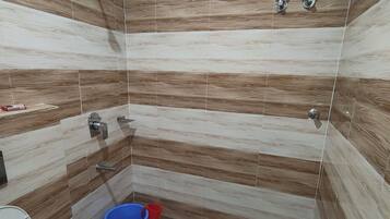 Shower, free toiletries, towels, soap