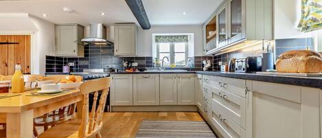 Oven, dishwasher, highchair, cookware/dishes/utensils