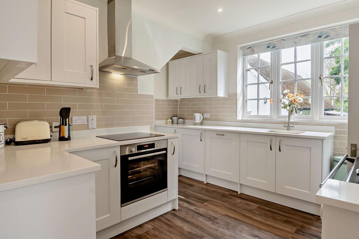 Oven, dishwasher, high chair, cookware/dishes/utensils