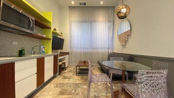 Deluxe Apartment, City View, Tower | Private kitchen | Espresso maker