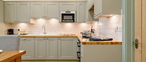 Dishwasher, high chair, cookware/dishes/utensils