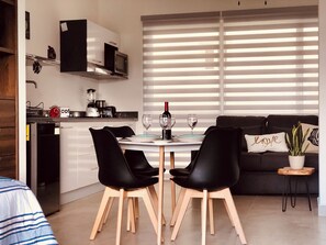 Superior Studio, 1 King Bed with Sofa bed, City View, Tower | Dining room - Stylish Studios with Rooftop Pool (Playa del Carmen)