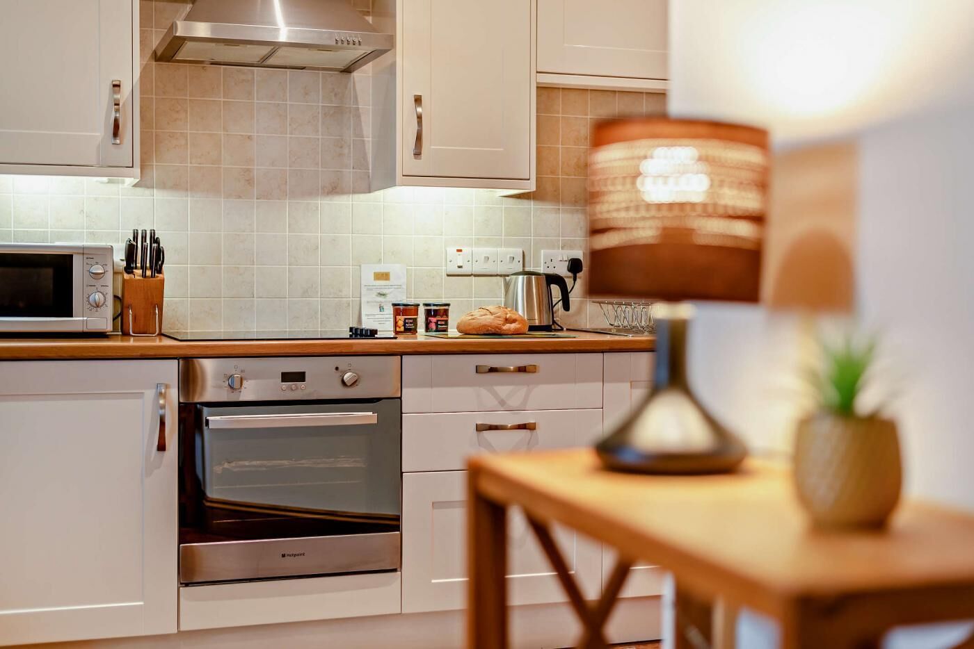 Microwave, oven, high chair, cookware/dishes/utensils