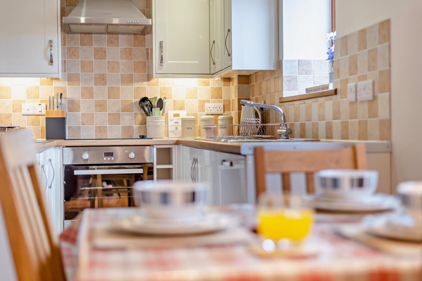 Microwave, oven, high chair, cookware/dishes/utensils