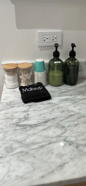 Hair dryer, towels, soap, toilet paper