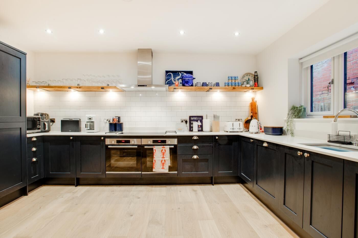 Oven, dishwasher, high chair, cookware/dishes/utensils