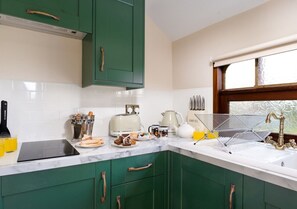Fridge, oven, cookware/dishes/utensils