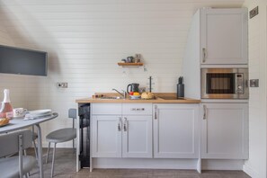 Microwave, oven, cookware/dishes/utensils