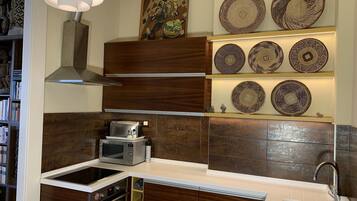 Fridge, stovetop, dishwasher, electric kettle