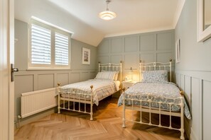 Fer et planche à repasser, Wi-Fi gratuit, draps fournis