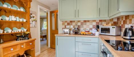 Microwave, oven, cookware/dishes/utensils