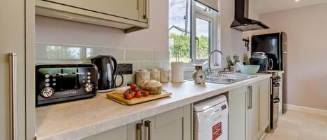 Oven, dishwasher, high chair, cookware/dishes/utensils