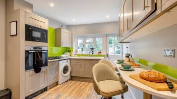 Microwave, oven, cookware/dishes/utensils