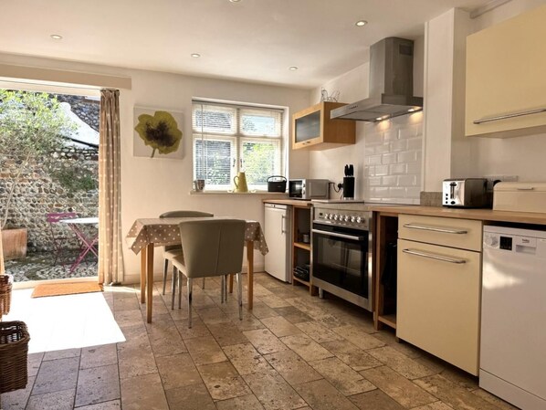 Microwave, dishwasher, cookware/dishes/utensils