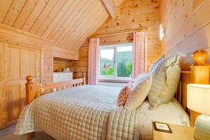 Iron/ironing board, travel crib, free WiFi, bed sheets