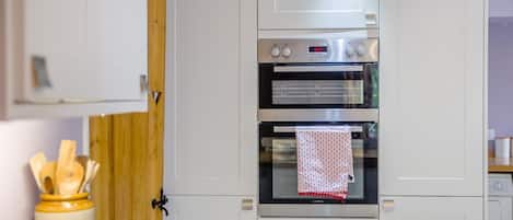 Oven, dishwasher, highchair, cookware/dishes/utensils