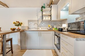 Microwave, oven, cookware/dishes/utensils