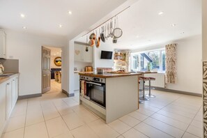 Dishwasher, high chair, cookware/dishes/utensils