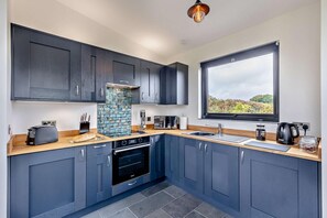 Microwave, oven, cookware/dishes/utensils