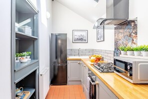 Oven, dishwasher, high chair, cookware/dishes/utensils