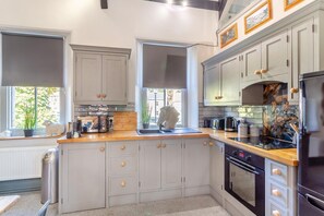 Oven, dishwasher, high chair, cookware/dishes/utensils