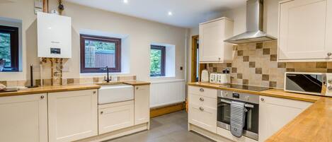 Microwave, oven, high chair, cookware/dishes/utensils