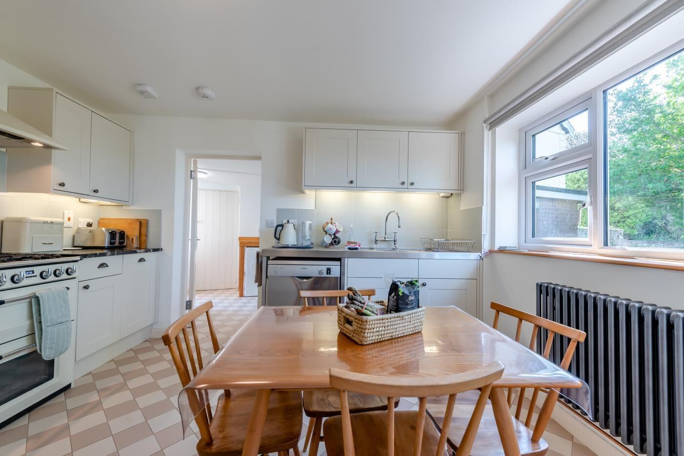 Oven, dishwasher, high chair, cookware/dishes/utensils