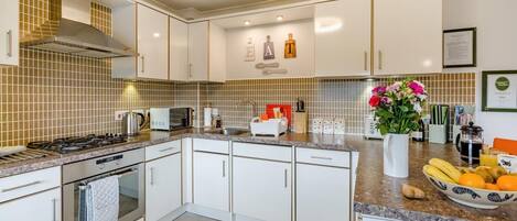 Oven, dishwasher, highchair, cookware/dishes/utensils