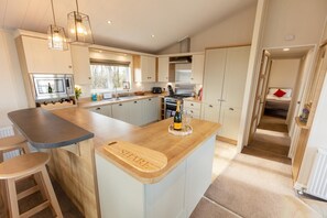 Microwave, oven, high chair, cookware/dishes/utensils