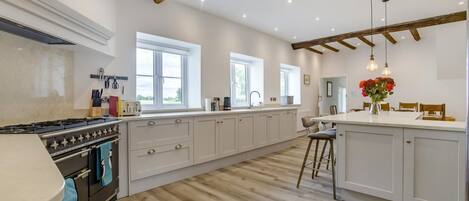 Oven, dishwasher, high chair, cookware/dishes/utensils