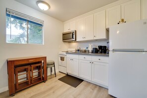 Fridge, microwave, stovetop, coffee/tea maker