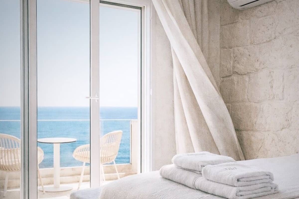 Premium bedding, down duvets, Select Comfort beds, minibar