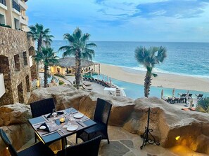 Outdoor dining - Spacious Grand Solmar unit overlooking pools and beach (Cabo San Lucas)