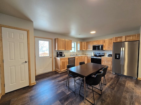Fridge, microwave, oven, stovetop. New construction within walking distance of downtown.