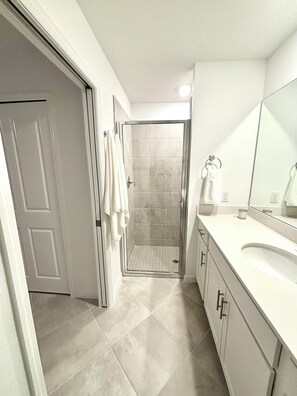 Shower, towels, soap, toilet paper