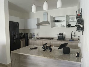 Deluxe Apartment, Balcony | Private kitchen - Mar y Tierra Depto 301-B (Manzanillo)
