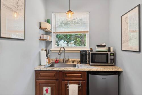 Amberjack Cottage | Private kitchen | Mini-fridge, microwave, coffee/tea maker, cookware/dishes/utensils