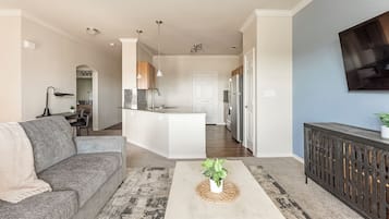 Apartment (1 Bedroom) | Living area | 50-inch TV with digital channels