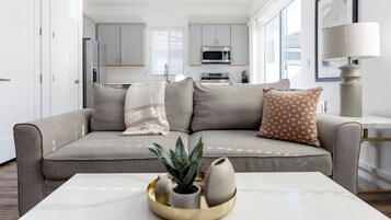 Apartment (2 Bedrooms) | Living area | 50-inch Smart TV with digital channels