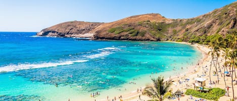 Beach nearby, white sand, sun loungers, beach umbrellas