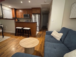 Family Apartment, Patio | Living area - 104 E Reed Alexandria (Alexandria)