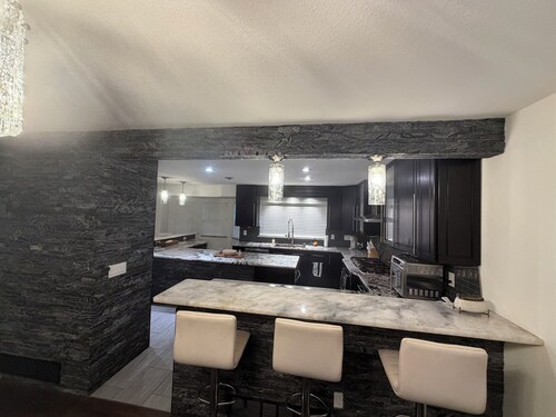 Spacious 4-bedroom house in charming Aurora with AC