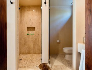 Deluxe Apartment | Bathroom | Shower, towels, soap, toilet paper