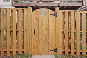 A wooden gate with a keyhole and a letter 'B' on the door. - Fireplace • BBQ Grill • Patio • Treadmill (Centreville)